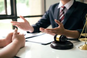 Attorney-Homepage-Photo-400×267 Lawyer speaking with client.